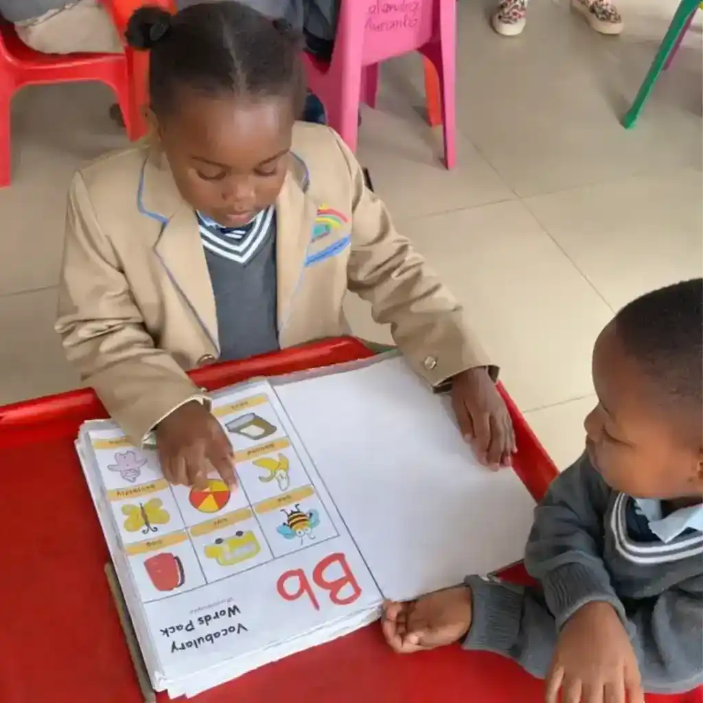 Children learning the alphabet at Sharell and Shalom Kids Centre