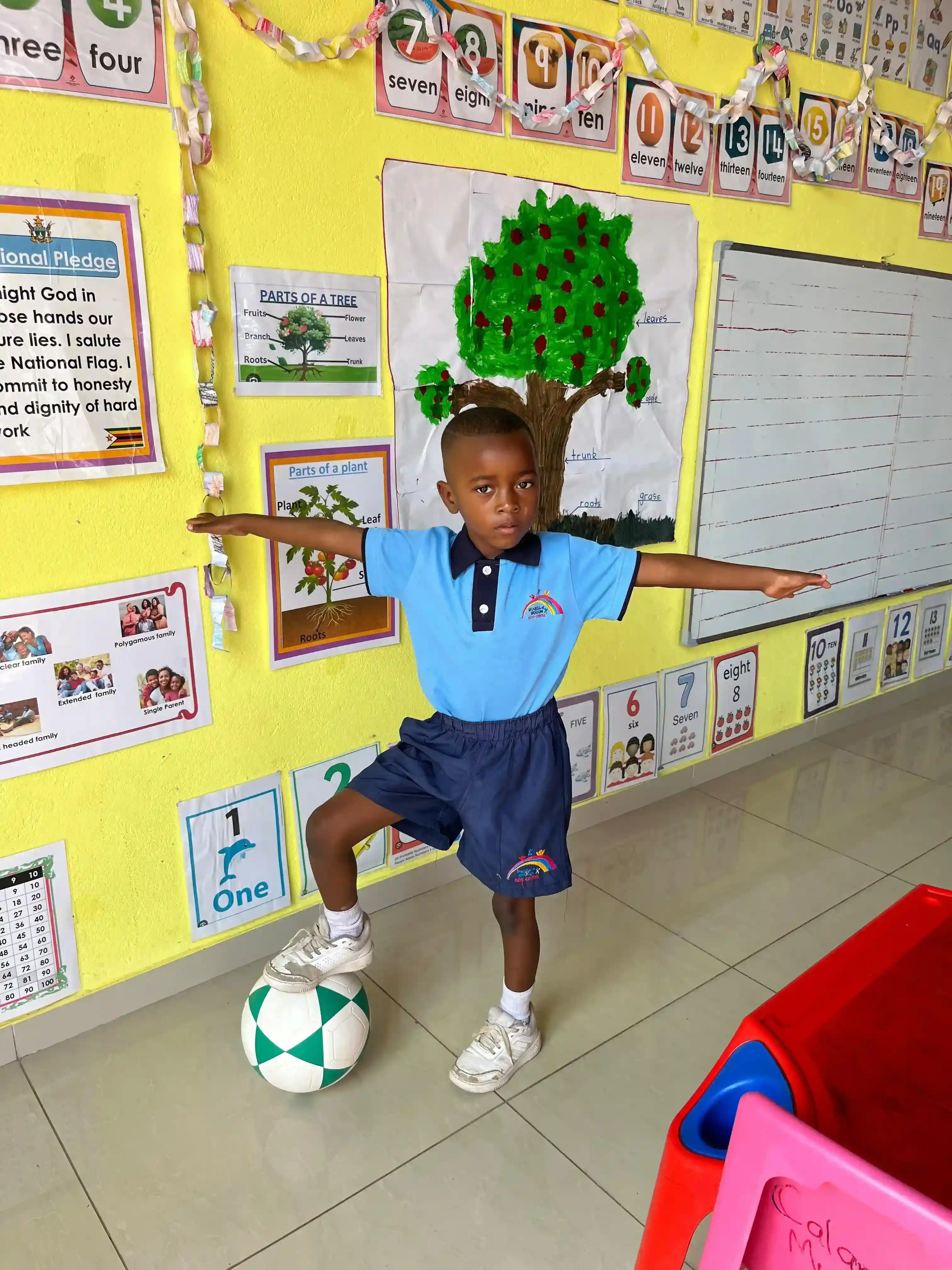 Boy playing soccer at Sharell and Shalom Kids Centre